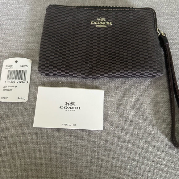 Coach Handbags - COACH Black Grey Zip Wristlet